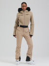 Combinaison de ski évasée Gsou Snow Mountain Chic pour femme, ornée de fausse fourrure.
