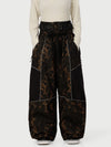 Pantalon de neige super ample Wild Motion pour femme, multipoches, à blocs de couleurs réfléchissants.