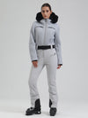 Combinaison de ski évasée Gsou Snow Mountain Chic pour femme, ornée de fausse fourrure.