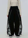 Pantalon de jogging ample pour femme, style jogging, avec empiècements et bandes réfléchissantes, style graffiti, couleur Hyper Flux.
