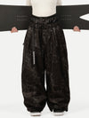Pantalon de neige ample OG pour femme, style urbain et inspiré des vêtements de travail, avec rivets apparents.