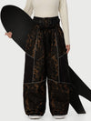 Pantalon de neige super ample Wild Motion pour femme, multipoches, à blocs de couleurs réfléchissants.