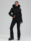 Combinaison de ski évasée Gsou Snow Mountain Chic pour femme, ornée de fausse fourrure.