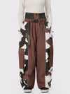 Pantalon de neige extra ample Wild Motion pour femme, à blocs de couleurs réfléchissants.