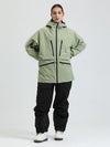 Combinaison de ski cargo multifonctionnelle Gsou Snow pour femme, résistante et performante.