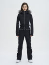 Combinaison de ski évasée pour femme, style montagne chic, avec bordure en fausse fourrure.