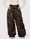 Pantalon de neige ample OG pour femme, style urbain et inspiré des vêtements de travail, avec rivets apparents.