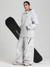 Combinaisons de ski amples Gsou Snow pour femmes, style montagne durable.