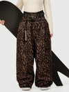 Pantalon de neige ample OG pour femme, style urbain et inspiré des vêtements de travail, avec rivets apparents.
