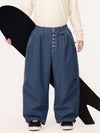 Pantalon de travail en denim brut à rivets pour homme, coupe oversize, avec double poche arrière.