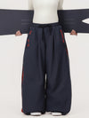Pantalon de ski freestyle extra ample Hyper Flux pour femme, fermeture éclair latérale et empiècement graffiti.