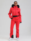 Combinaison de ski évasée Gsou Snow Mountain Chic pour femme, ornée de fausse fourrure.