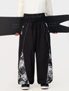 Pantalon de jogging ample de ski pour homme, style graffiti, avec empiècements colorés et bandes réfléchissantes.