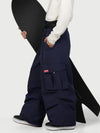 Pantalon de neige cargo ample et fonctionnel pour homme, avec ceinture utilitaire et poches multiples.