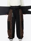Pantalon de neige extra ample Wild Motion pour homme, à blocs de couleurs réfléchissants.