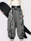 Pantalon de neige extra ample Wild Motion pour femme, à blocs de couleurs réfléchissants.