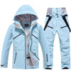 Ensemble veste et pantalon de ski isolés pour homme, idéal pour la montagne.
