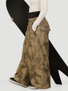 Pantalon de neige ample OG pour femme, style urbain et inspiré des vêtements de travail, avec rivets apparents.
