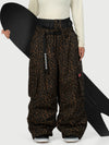 Pantalon de neige cargo ample et fonctionnel pour femme, avec ceinture utilitaire et poches multiples