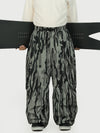 Pantalon de neige extra ample Wild Motion pour homme, avec poches cargo réfléchissantes.