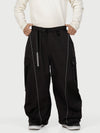 Pantalon de neige extra ample Wild Motion pour homme, avec poches cargo réfléchissantes.