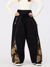 Pantalon de jogging ample pour femme, style jogging, avec empiècements et bandes réfléchissantes, style graffiti, couleur Hyper Flux.