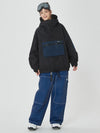 Combinaison de snowboard ample pour femme, style freeride.