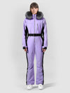 Combinaison de ski une pièce pour femme avec capuche en fourrure, style hiver chic.