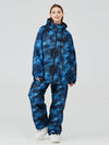 Ensemble veste et pantalon de neige pour femme, idéal pour les aventures hivernales en plein air.