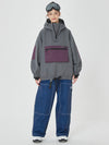 Combinaison de snowboard ample pour femme, style freeride.