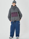 Combinaison de snowboard ample pour femme, style freeride.