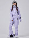 Combinaison de ski intégrale Arctic Chic pour femme, style montagnard glamour.