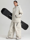 Combinaisons de ski amples Gsou Snow pour femmes, style montagne durable.