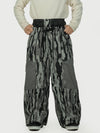 Pantalon de ski Wild Motion pour homme, multipoches, à blocs de couleurs réfléchissants et très ample.