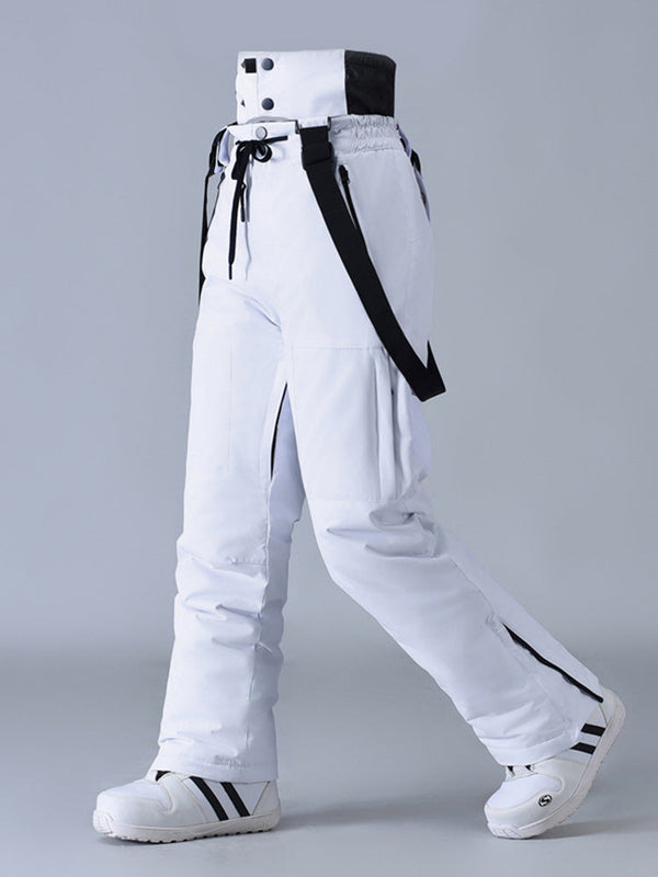 Salopette de ski SnowPeak StormGuard pour femme, isolée et résistante aux intempéries.