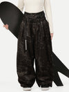Pantalon de neige ample OG pour femme, style urbain et inspiré des vêtements de travail, avec rivets apparents.