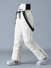 Salopette de ski SnowPeak StormGuard pour femme, isolée et résistante aux intempéries.