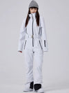 Combinaison de ski intégrale Arctic Chic pour femme, style montagnard glamour.