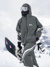 Combinaison de ski ample deux pièces John Snow Freestyle pour femme, à rayures latérales.