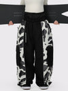 Pantalon de neige extra ample Wild Motion pour femme, à blocs de couleurs réfléchissants.