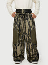 Pantalon de ski Wild Motion pour homme, multipoches, à blocs de couleurs réfléchissants et très ample.