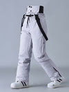 Salopette de ski SnowPeak StormGuard pour femme, isolée et résistante aux intempéries.