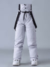 Salopette de ski SnowPeak StormGuard pour femme, isolée et résistante aux intempéries.