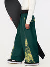 Pantalon de jogging ample de ski pour homme, style graffiti, avec empiècements colorés et bandes réfléchissantes.