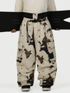 Pantalon de neige cargo ample et fonctionnel pour homme, avec ceinture utilitaire et poches multiples.