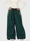 Pantalon de ski freestyle extra ample Hyper Flux pour femme, fermeture éclair latérale et empiècement graffiti.
