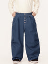 Pantalon de travail en denim brut à rivets pour homme, coupe oversize, avec double poche arrière.