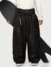 Pantalon de neige ample OG pour homme, style urbain, inspiré des vêtements de travail, avec rivets apparents et coupe large.
