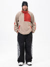 Pull en polaire sherpa synthétique pour homme et pantalon de ski cargo réfléchissant.