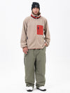 Pantalon de ski ample et zippé en polaire sherpa synthétique pour homme, avec genoux renforcés.